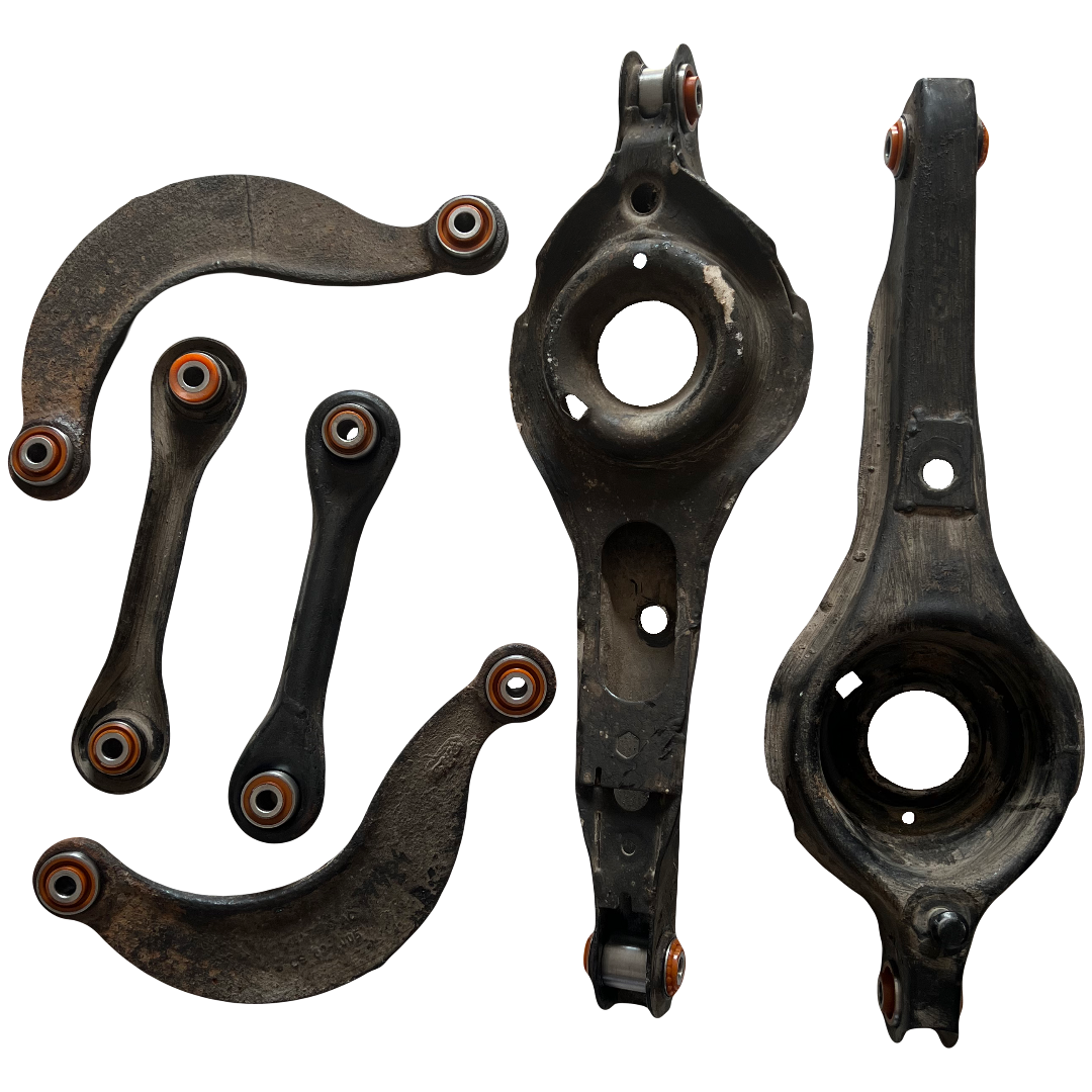 Задня підвіска автомобіля Ford Focus C-Max 2003-2007 Послуга з перепресування сайлентблоків (Сайлентблоки в ціну не входять)